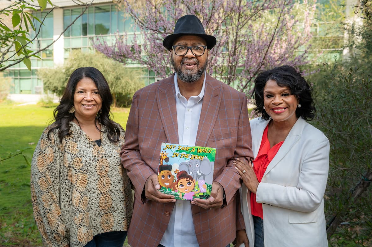 Three people and a book.
