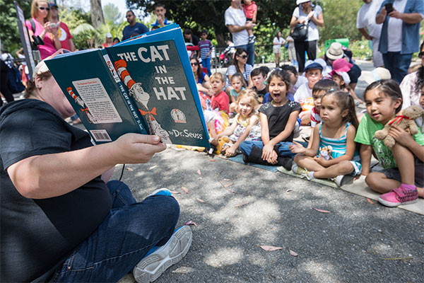 Reading Cat in the Hat to kids in Play Park at LA Zoo Story Time.