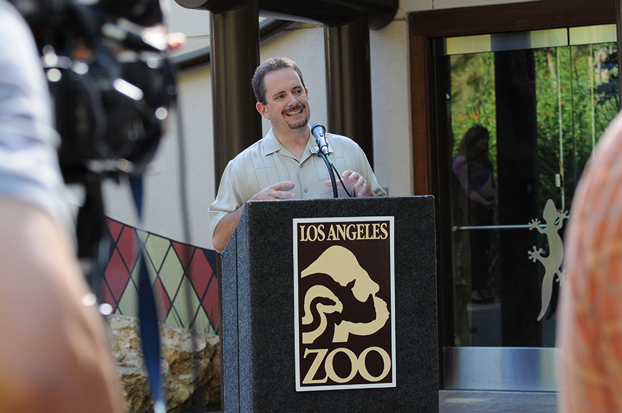 Ian speaking in the LAIR at a podium.